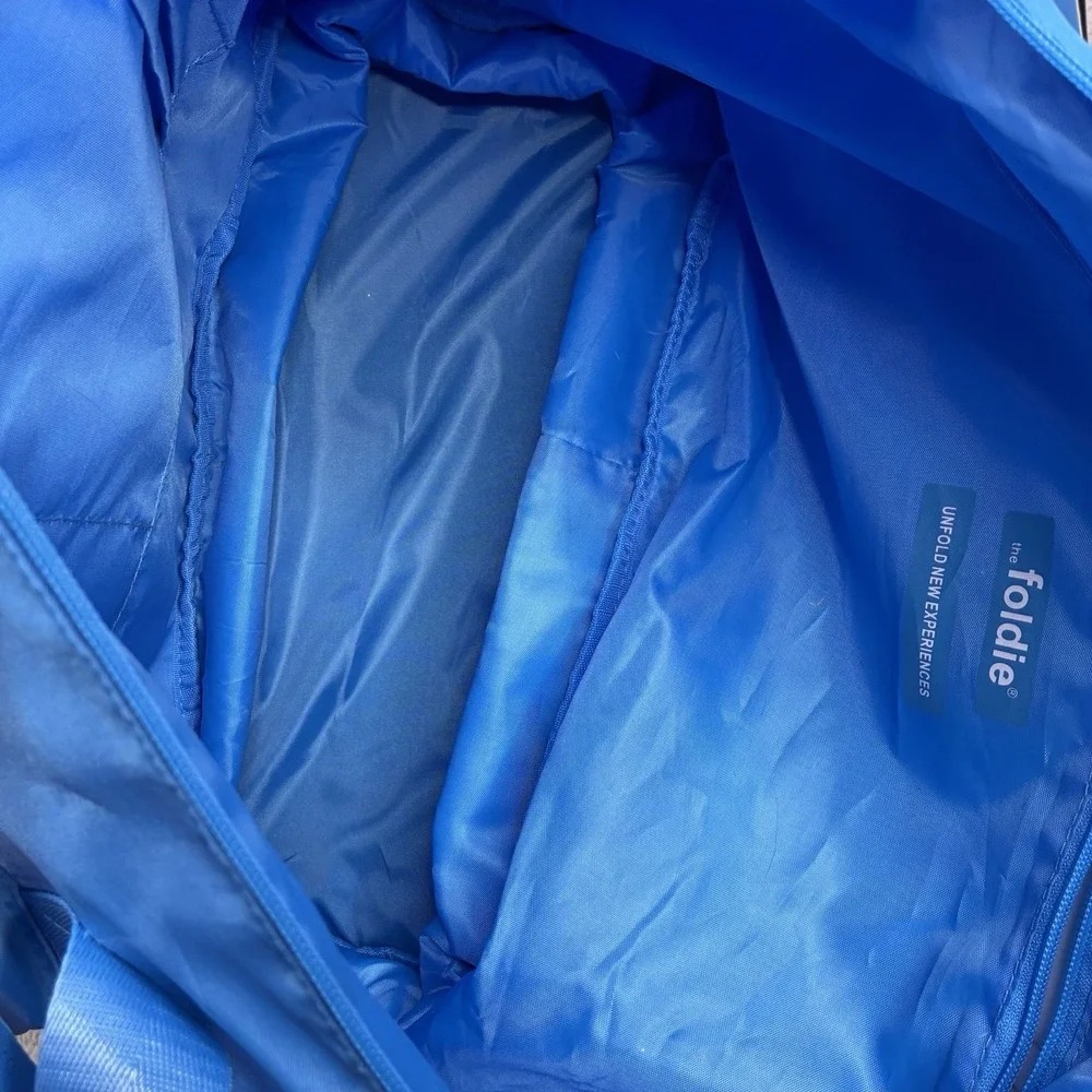 The Foldie 40L Travel Bag Carry On Expandable Azure Blue Weekender Tote NWT